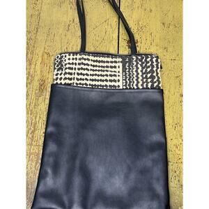 Lee Coren Began Leather Purse